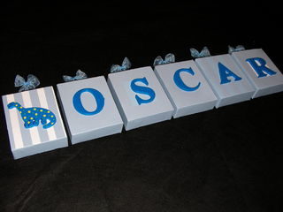Personalised Canvas 'Oscar' Blue Dinosaur with ribbon